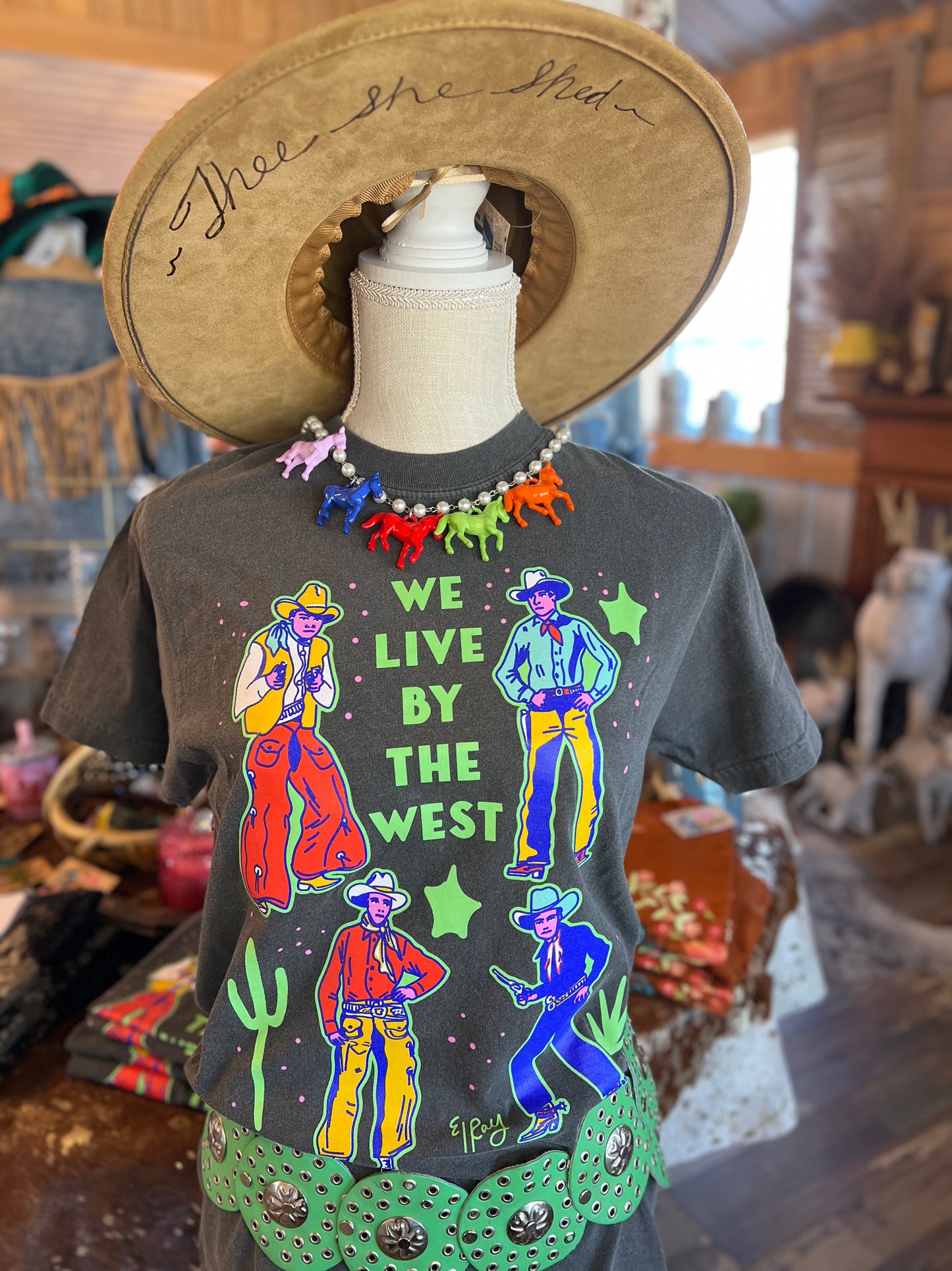 We live by the West Tee